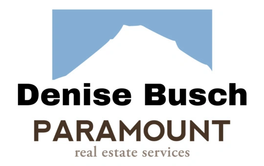 Denise-Busch-1 Denise Busch Paramount Real Estate Services -logo - white mountain with blue background behind top of mountain